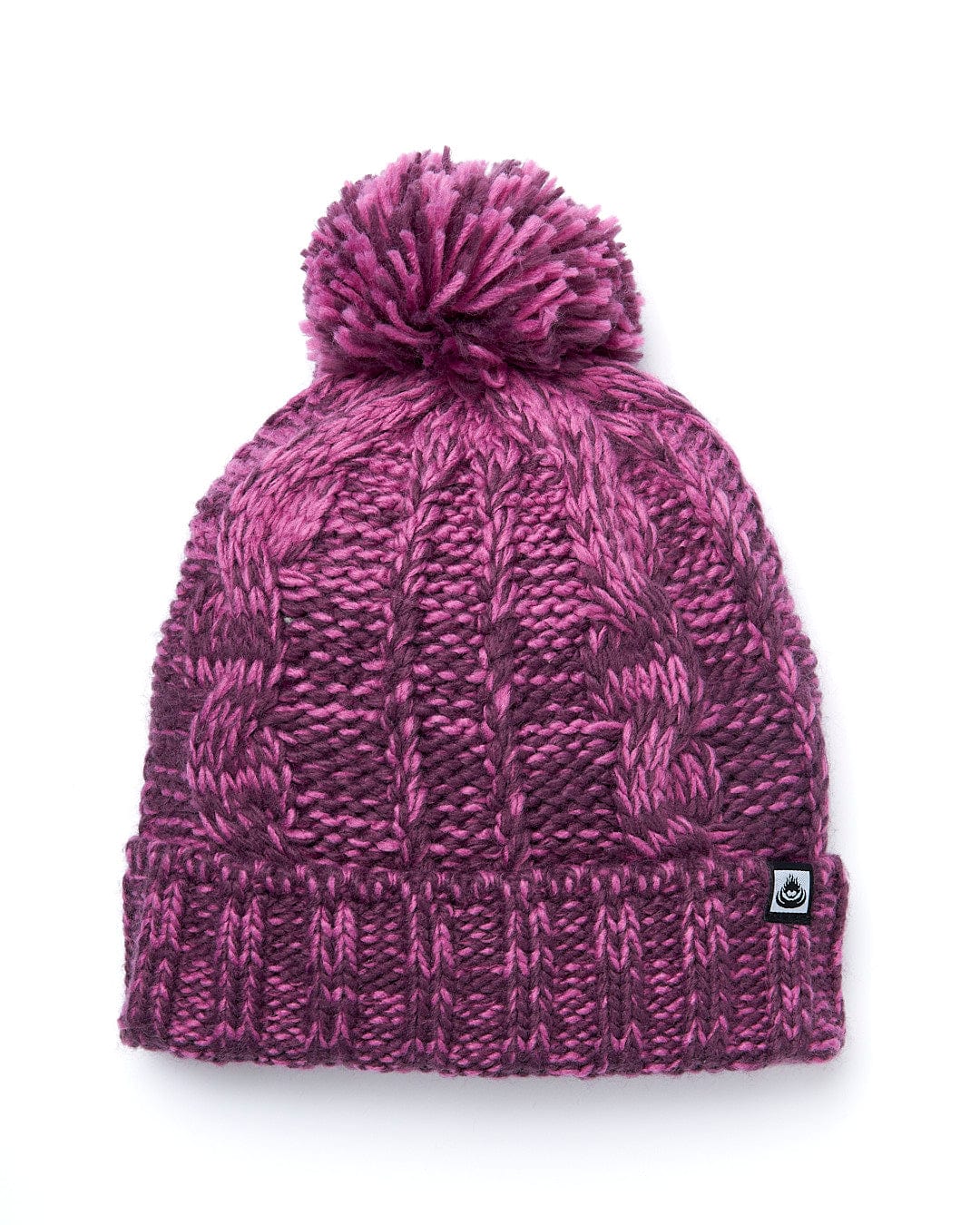 A Twist - Cabled Beanie - Dark Pink with a pom pom.