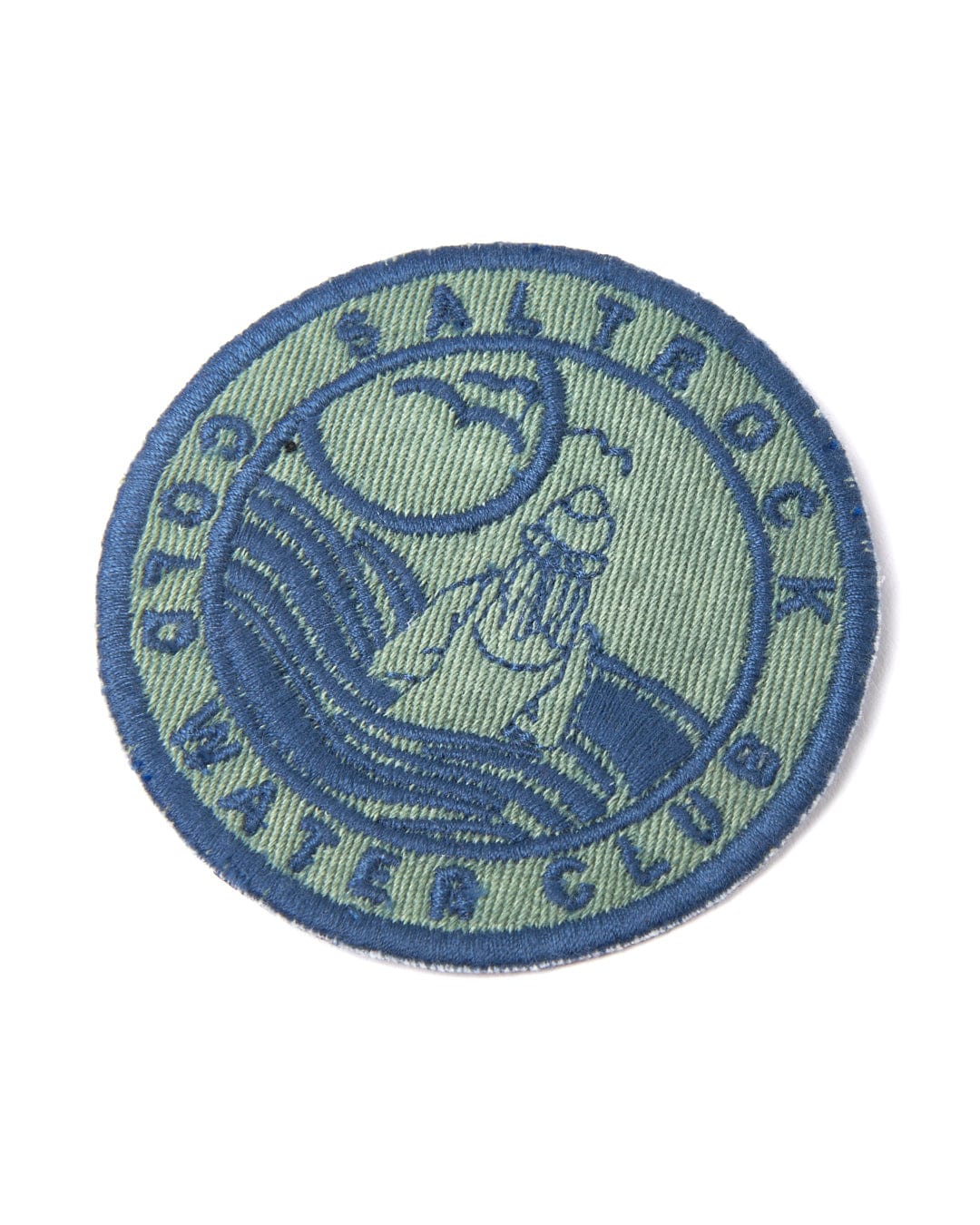 An embroidered green patch with the words "Cold Water Club" on it by Saltrock.