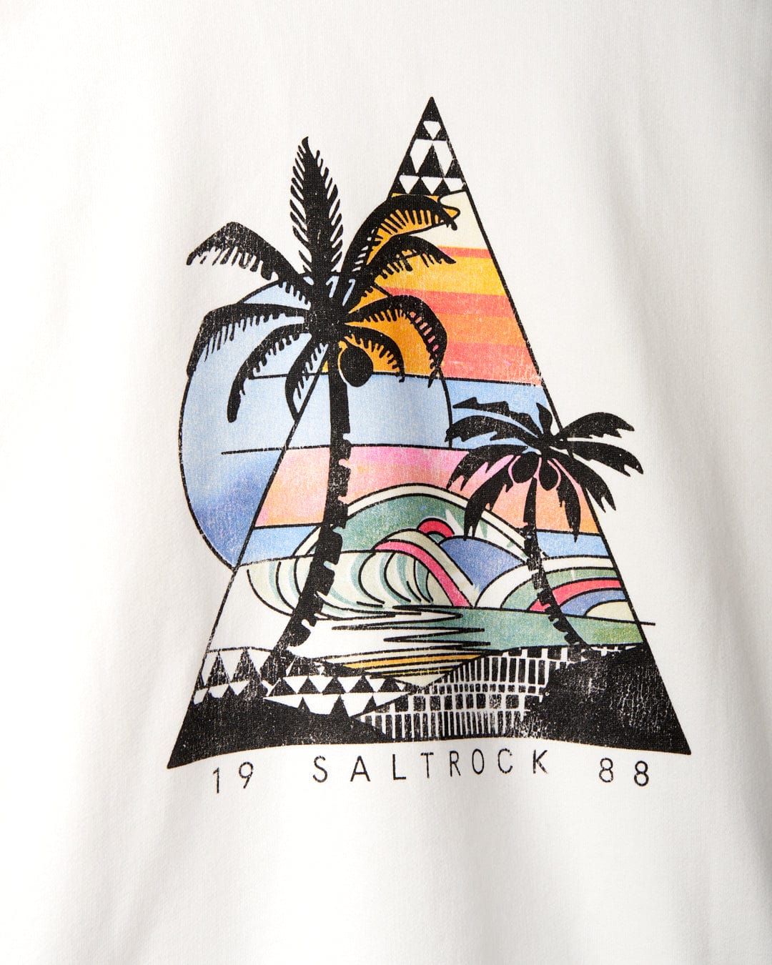 Graphic of palm trees and ocean waves within a triangle, featuring a colorful sunset backdrop. Text below reads "Geo Beach - Womens Pop Hoodie - White" with signature Saltrock branding.