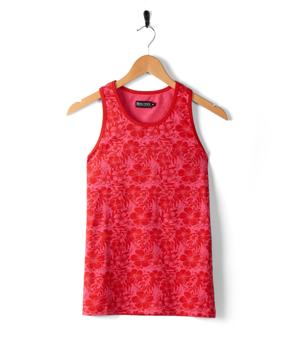 A Saltrock Hibiscus - Womens Vest - Red is displayed on a wooden hanger against a white background.