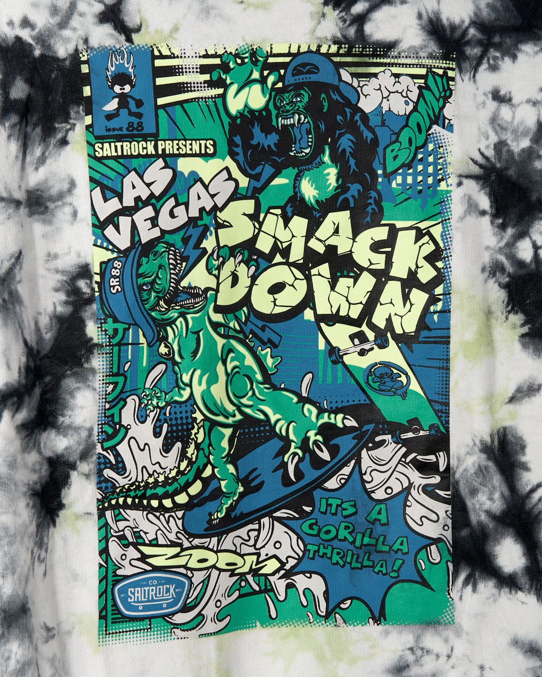 Las Vegas Smackdown - Kids Glow in the Dark Oversized Pop Hoodie - Multi featuring a cartoon gorilla and dinosaur fighting with comic-style text saying "Las Vegas Smack Down" and "It's a Gorilla Thrilla!" by Saltrock. The design has vibrant blue and green colors and includes glow in the dark graphics for an extra punch.