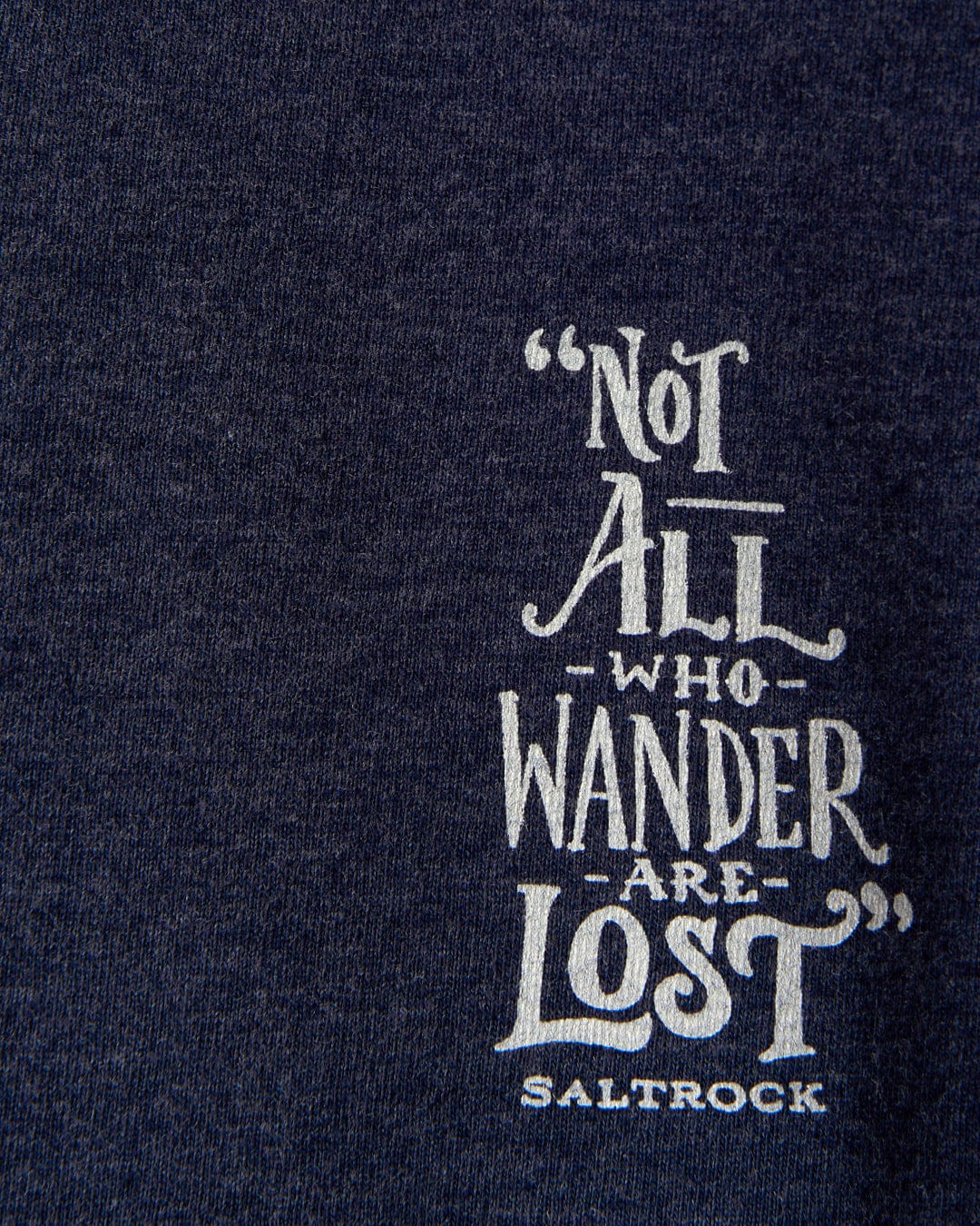 The Lost Ships Women's T-Shirt in navy blue by Saltrock is made from 100% cotton and features the text "Not all who wander are lost" with "Saltrock" in small print underneath. It's machine washable for easy care.