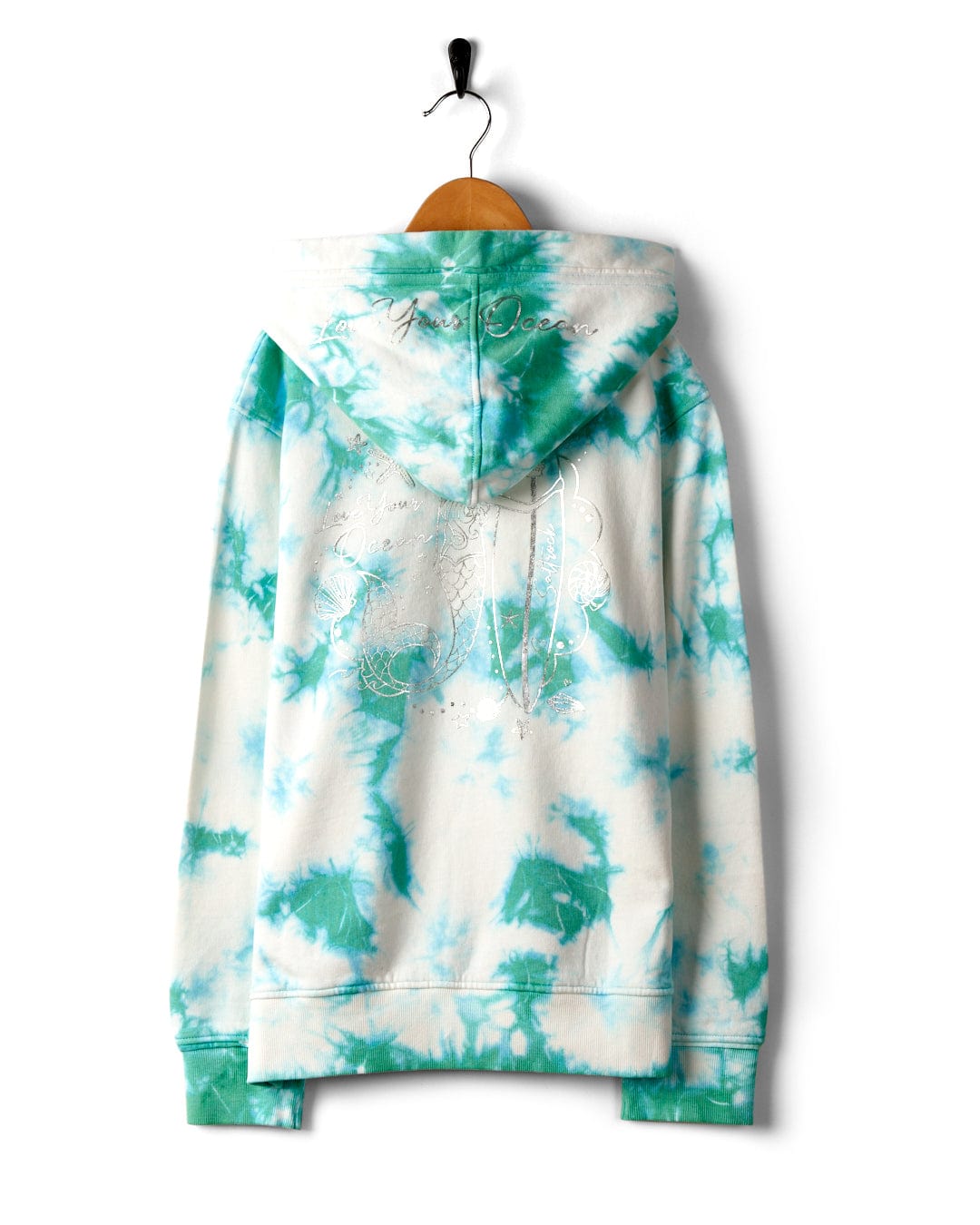 A "Mermaid Surf - Kids Tie Dye Pop Hoodie - Turquoise/White" hoodie with blue and green patterns on a wooden hanger against a white background.