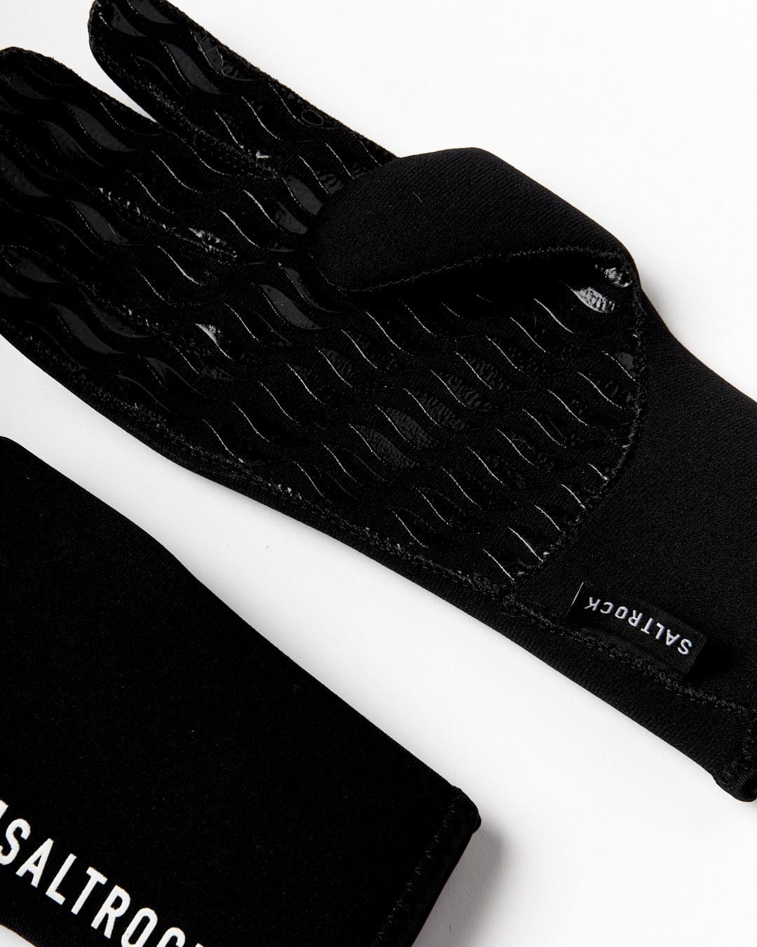 The Neoprene Technical Cold Water Gloves - Black by Saltrock feature a textured grip and display the distinctive "Saltrock" label on a white background.