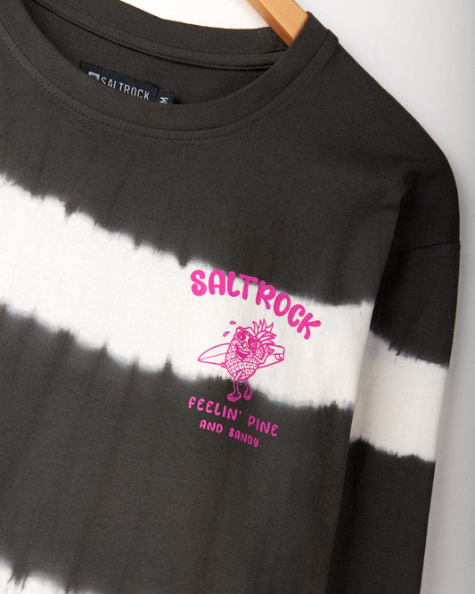 Black and white tie-dye print shirt with a pink graphic of a surfing pineapple and text "Saltrock Feelin' Pine and Bambu." Crafted from 100% cotton, it proudly showcases Saltrock branding. The product is the Pine And Sandy - Mens Long Sleeve T-Shirt - Grey/White by Saltrock.