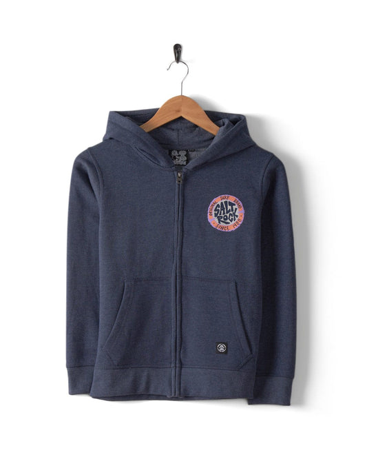 The SR Original - Kids Zip Hoodie - Blue by Saltrock, featuring a small circular branding logo on the chest, is crafted from soft cotton and hangs on a wooden hanger against a white background.