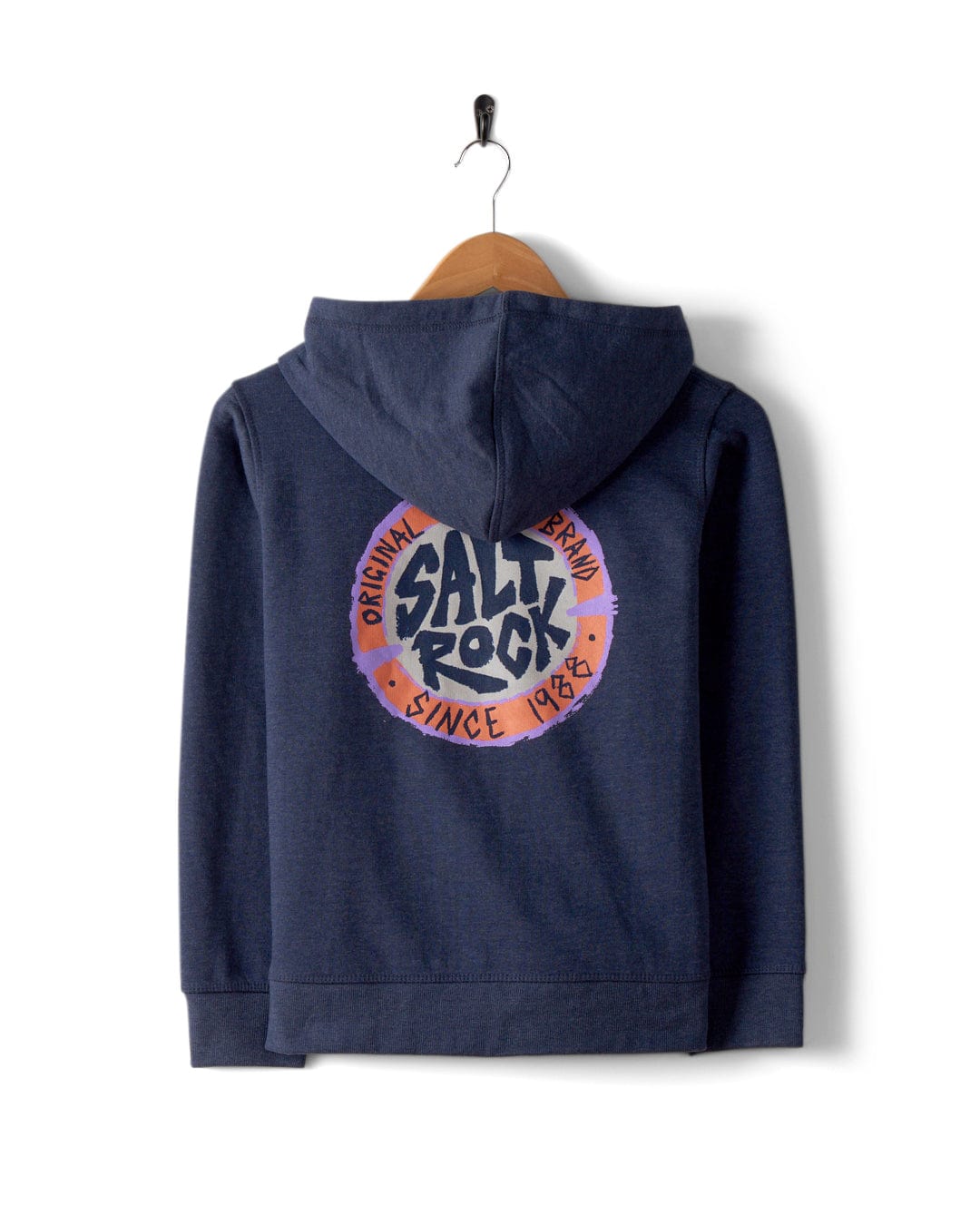 A blue kids' zip hoodie crafted from soft cotton hangs on a wooden hanger, showcasing the iconic circular Saltrock logo with the text "Original Brand Since 1988." It features classic Saltrock branding and a comfortable hood.