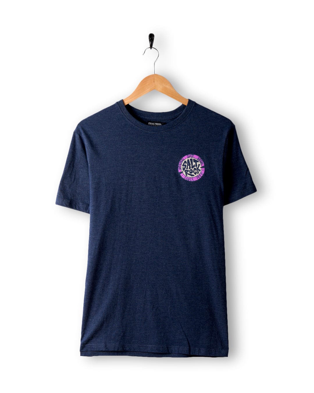 A navy blue Saltrock SR Original Men's T-Shirt with a small, colorful "Salt Tropez" logo on the left chest, made from 60% cotton, hanging on a wooden hanger against a white background.