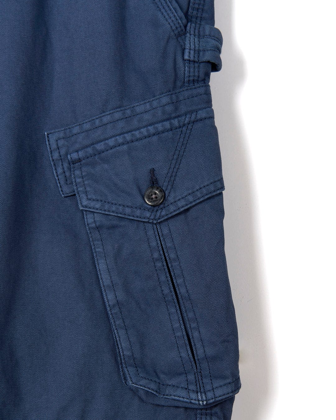 A close up of a Penwith II - Mens Cargo Short - Blue, showcasing its practical style with a Saltrock twist.