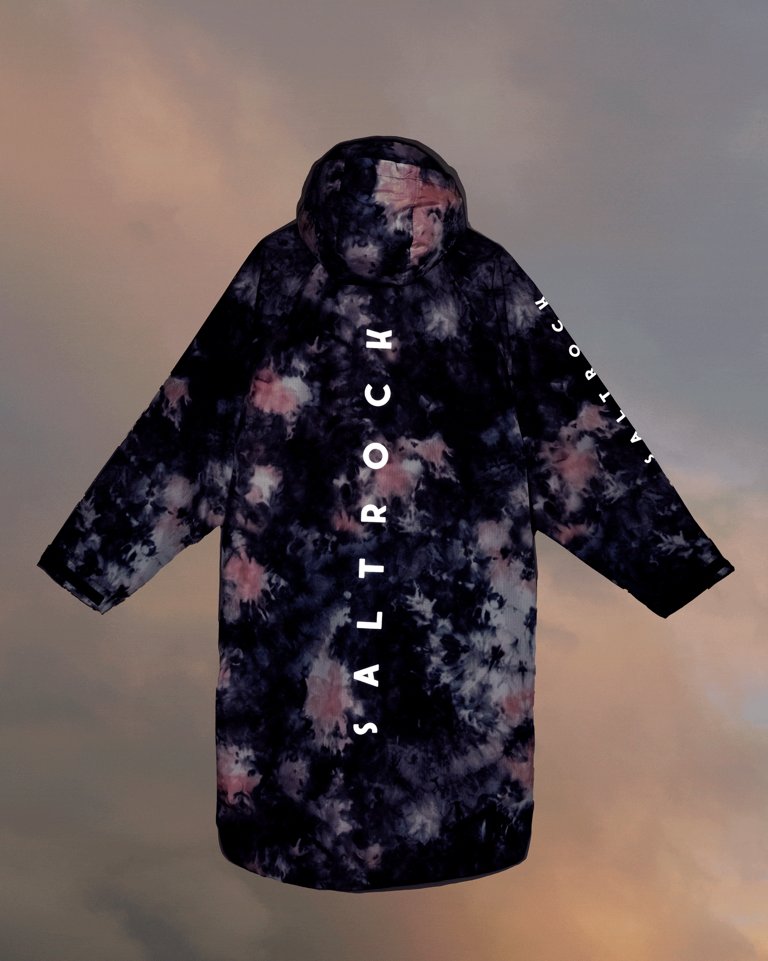 A black and white Four Seasons - Tie Dye Waterproof Changing Robe - Pink hoodie with the word 'Saltrock' on it.